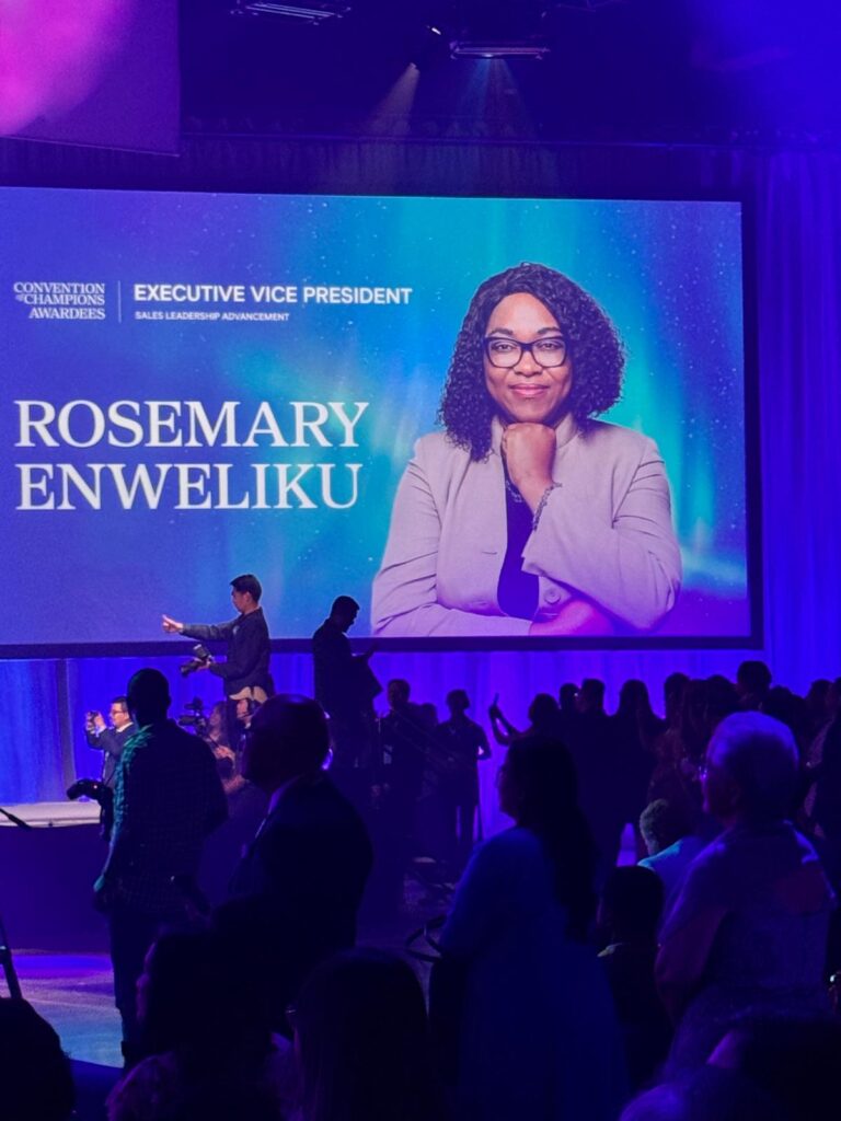 2025 Convention Calgary A photo of executive vice president Rosemary Enweliku is displayed on a large screen during the Calgary 2025 convention.